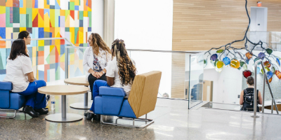 Nursing Students talking around a table